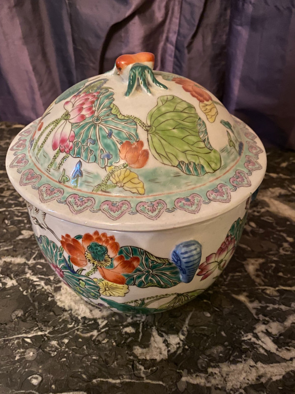 Ornamental Chinese porcelain ginger pot decorated with Lotus flowers, foliage and birds.