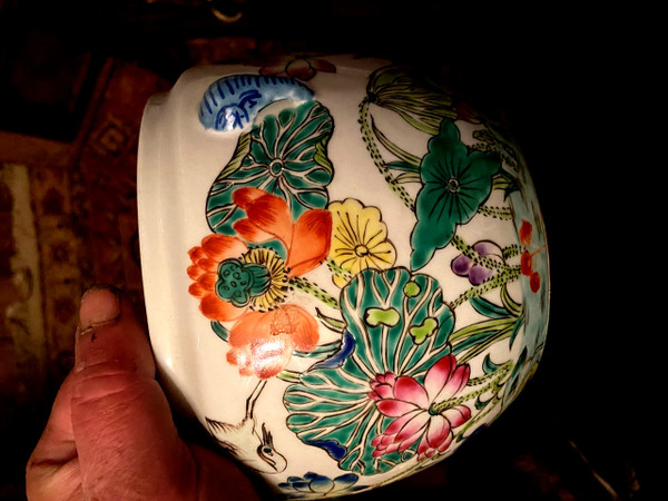 Ornamental Chinese porcelain ginger pot decorated with Lotus flowers, foliage and birds.