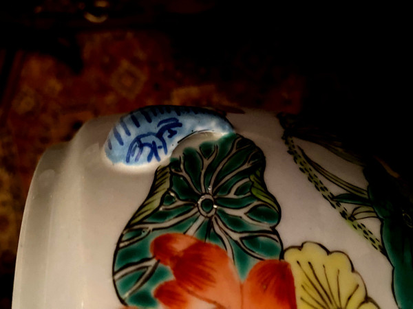 Ornamental Chinese porcelain ginger pot decorated with Lotus flowers, foliage and birds.