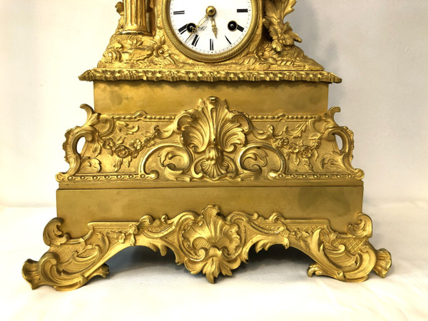 Large antique gilt bronze clock with blown glass globe, 19th c.