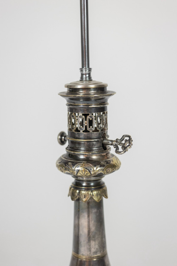 Pair of metal and silver-plated bronze lamps. Circa 1880