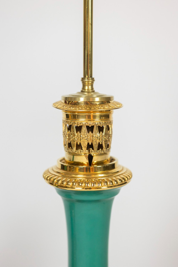 Coppia di lampade parigine in porcellana e bronzo dorato. 1850 circa.