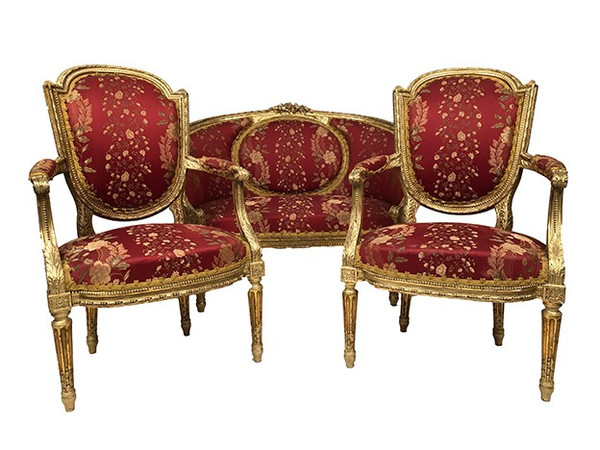 Louis XVI style living room set in gilded wood. Basket sofa and pair of armchairs