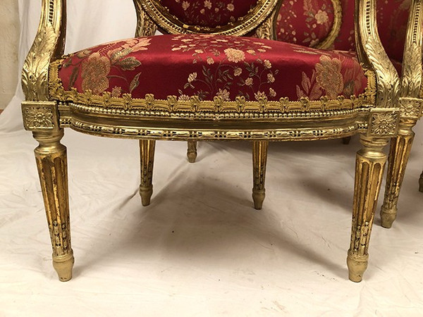 Louis XVI style living room set in gilded wood. Basket sofa and pair of armchairs