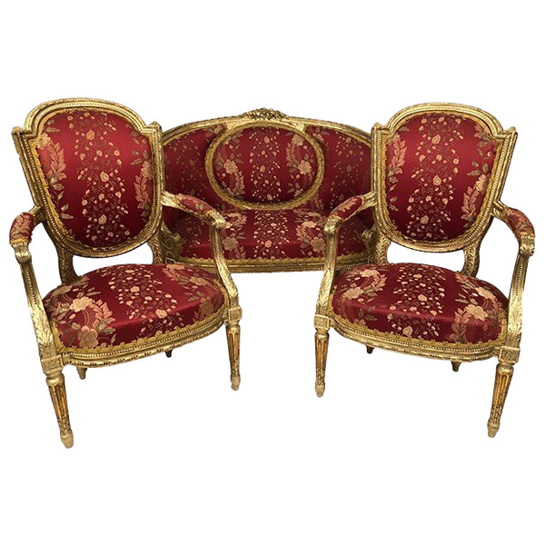 Louis XVI style living room set in gilded wood. Basket sofa and pair of armchairs