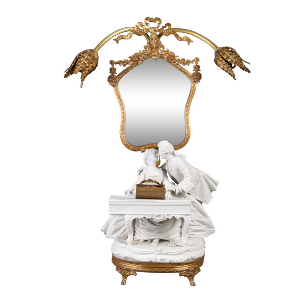 A romantic group in biscuit mounted lamp late 19th century