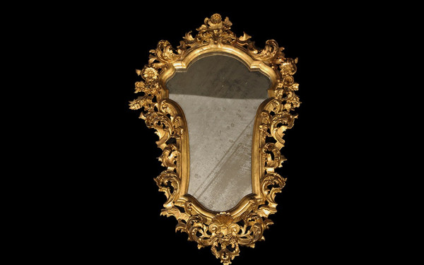  18th century Italian baroque mirror, gilded wood leaf