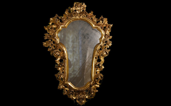  18th century Italian baroque mirror, gilded wood leaf