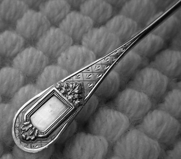 Napoleon III 19th century sprinkling spoon in solid silver, neck brace hallmark