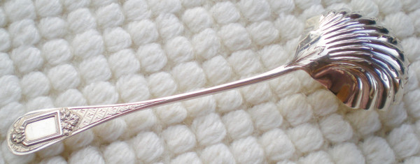 Napoleon III 19th century sprinkling spoon in solid silver, neck brace hallmark