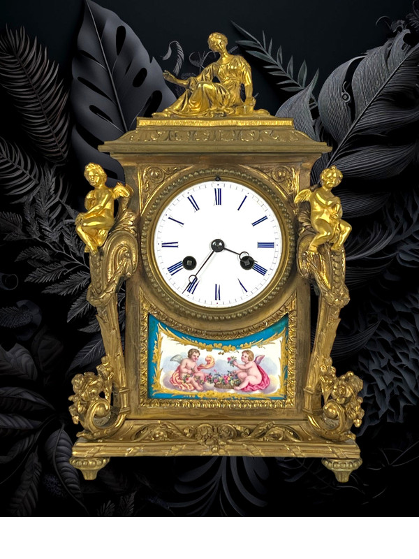 19th CENTURY CLOCK IN GILT BRONZE AND SÈVRES PORCELAIN DECORATED WITH CHARACTERS