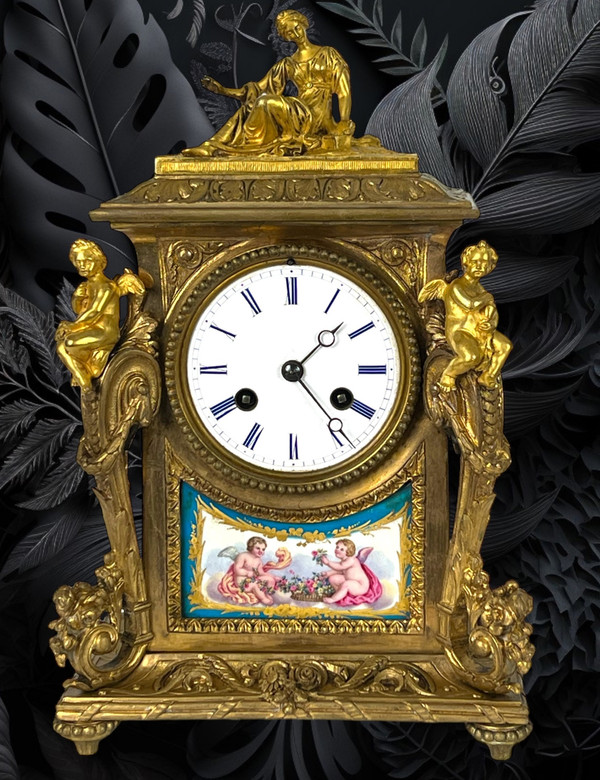 19th CENTURY CLOCK IN GILT BRONZE AND SÈVRES PORCELAIN DECORATED WITH CHARACTERS