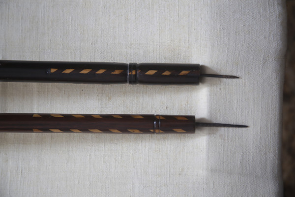 Foldable camp bed in rosewood and marquetry, 18th century.