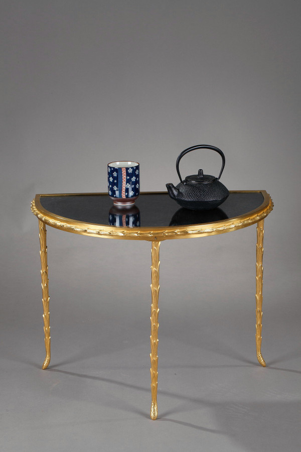 Small half moon table with aged mirror top in bronze, Maison Baguès