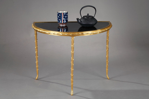 Small half moon table with aged mirror top in bronze, Maison Baguès