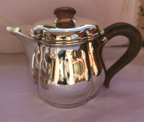 Art deco tea service in solid silver, punch neck brace Goldsmith Fouquet-Lapar