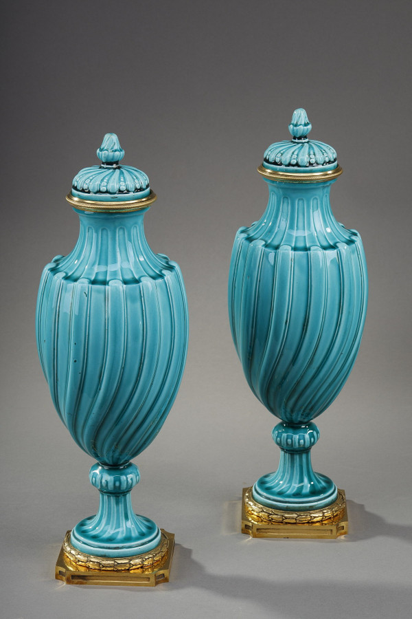 Pair of Louis XVI style covered vases in ceramic 