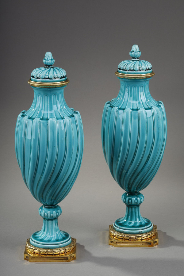 Pair of Louis XVI style covered vases in ceramic 