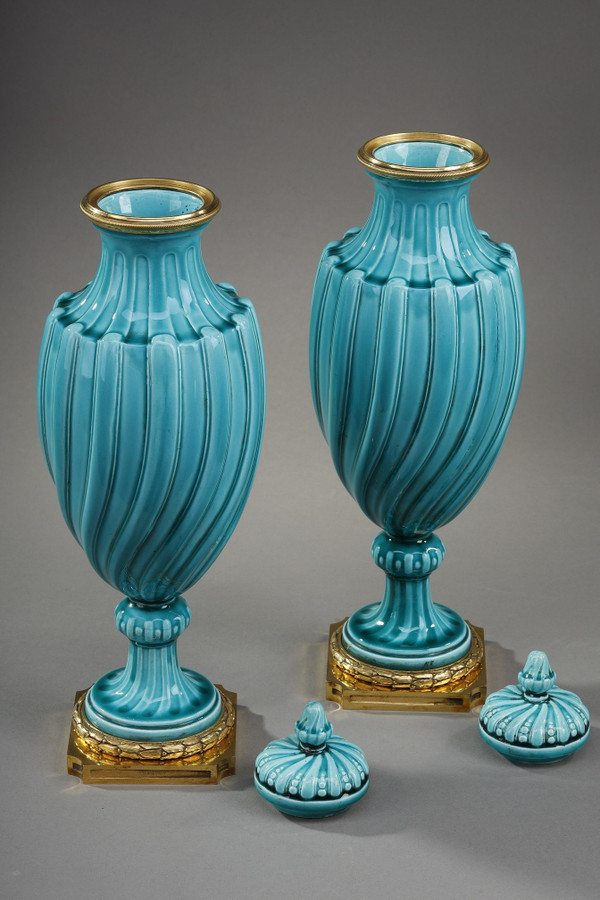 Pair of Louis XVI style covered vases in ceramic 