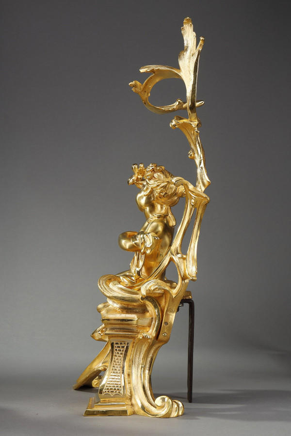 PAIR OF GILDED ANDIRONS IN THE LOUIS XV STYLE BRONZE