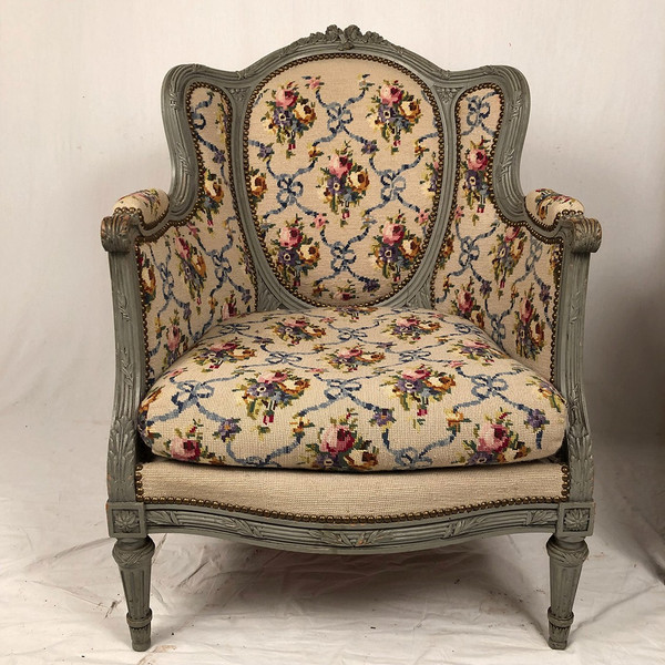 Pair of Louis XVI style wing chairs in gray lacquered wood. Late 19th century