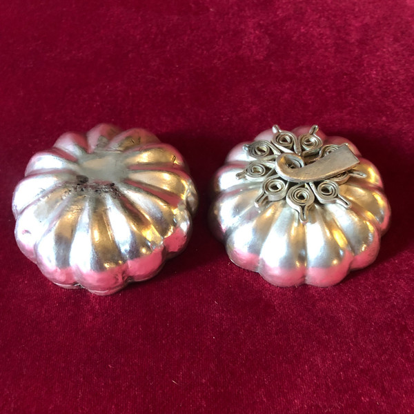 Two foreign silver pumpkins