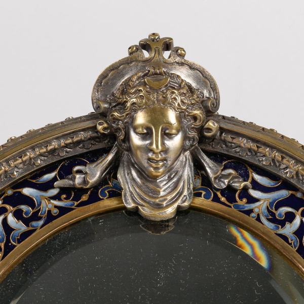 A late 19th century bronze and cloisonné enamel table mirror