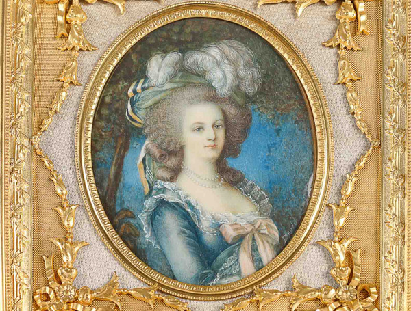 A beautiful ivory painting of Marie Antoinette in a late 19th century gilt bronze frame.