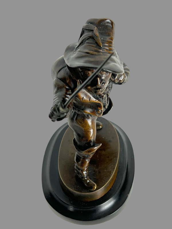 19th CENTURY PYROGEN / BRONZE CHARACTER ON A MARBLE SOCLE "THE SWORDED GROtesQUE".