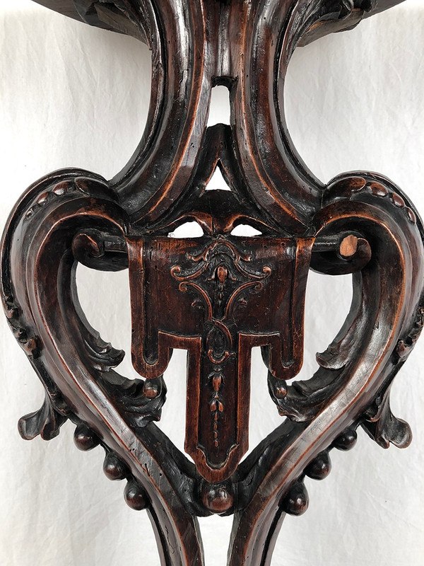 Richly carved walnut sellette, 18th century