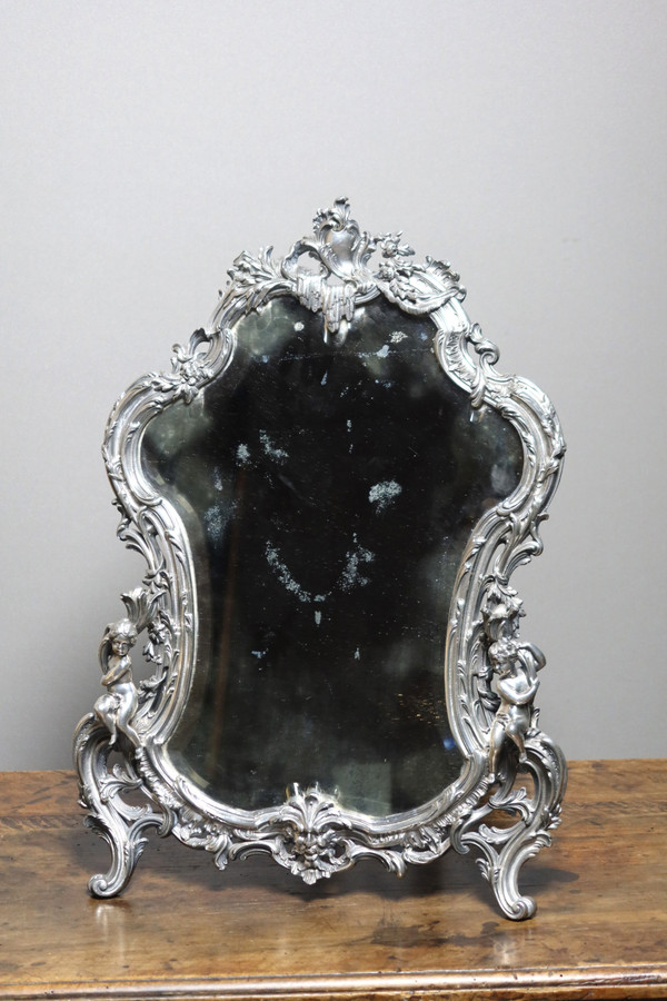 Table mirror with cherubs