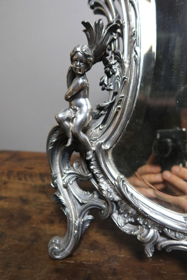 Table mirror with cherubs