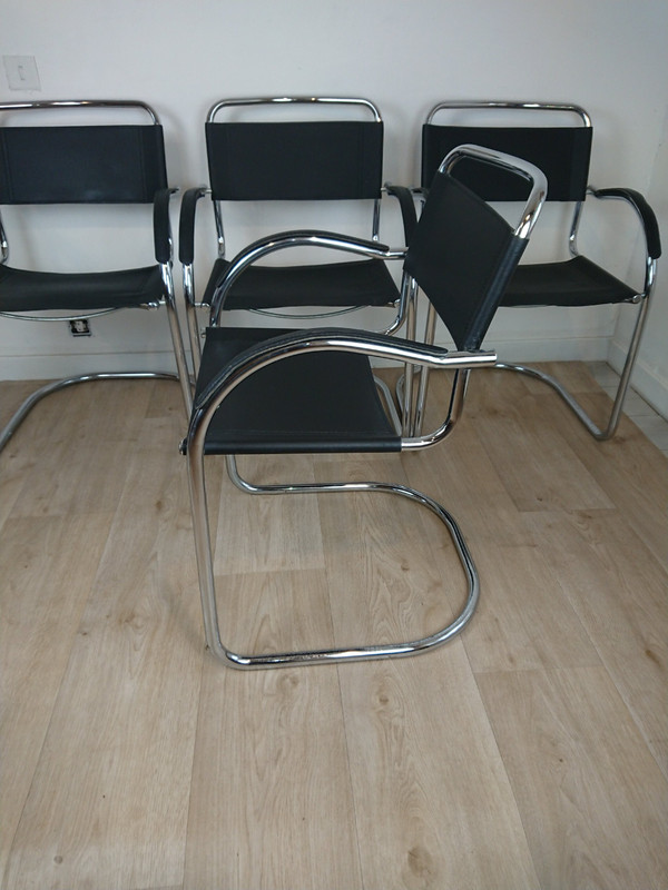 Cantilever tubular steel chairs and armchairs