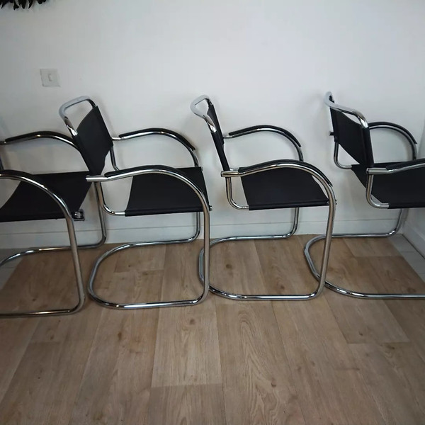 Cantilever tubular steel chairs and armchairs