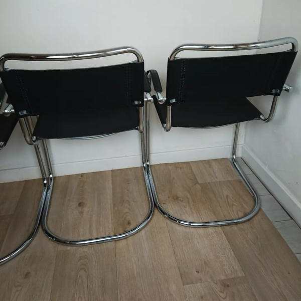 Cantilever tubular steel chairs and armchairs