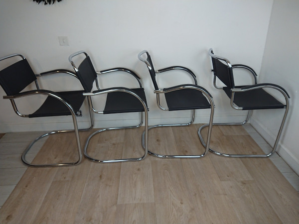 Cantilever tubular steel chairs and armchairs