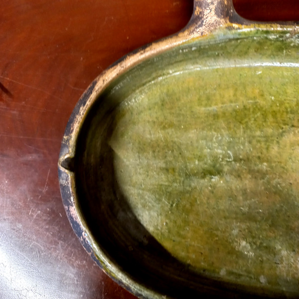 19th century glazed green terracotta drip pan