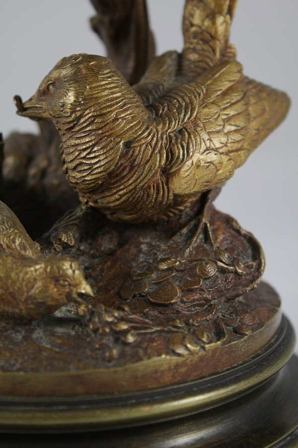 Bronze candle holder sculpture 'Perdix feeding his partridges' late 19th century