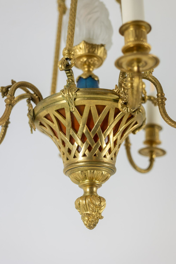 Lustre de style Louis XVI en bronze doré. Circa 1900.