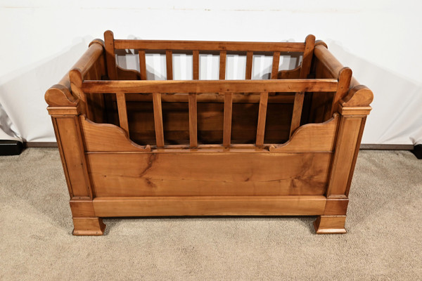 Small Rolling crib in cherry wood - 1900