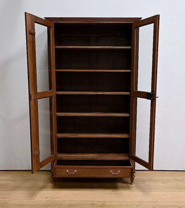 Solid walnut bookcase, Louis XVI style - Mid-19th century