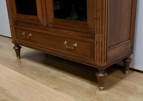 Solid walnut bookcase, Louis XVI style - Mid-19th century