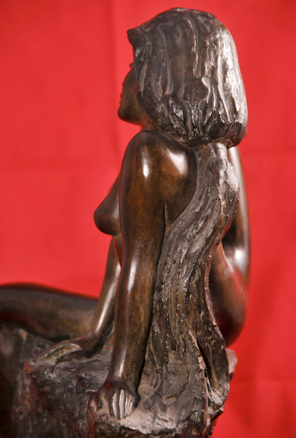  Jean-Pierre GONNIN, Young woman sitting on a rock, bronze