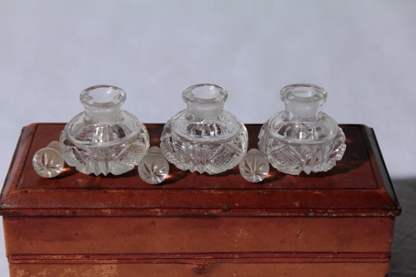 Leather box with 3 so-called “scent” crystal bottles from the 19th century