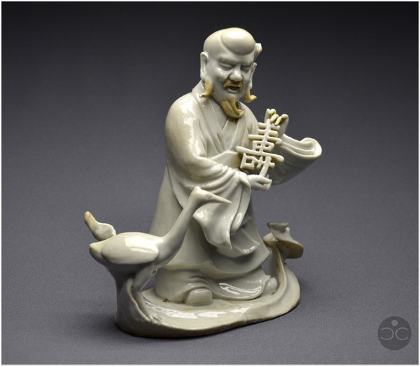 China, 18th century, Chinese white porcelain group depicting the Taoist god Shoulao