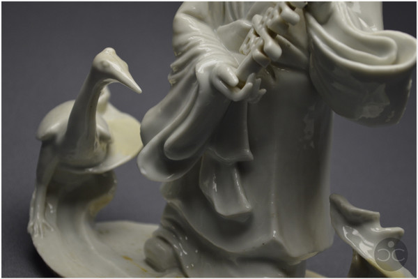 China, 18th century, Chinese white porcelain group depicting the Taoist god Shoulao