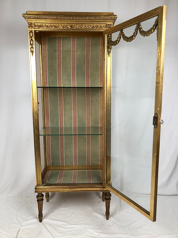 Louis XVI-style gilded stucco and wood display case, circa 1900