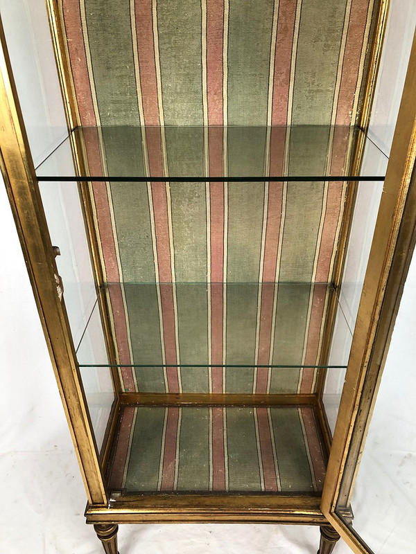 Louis XVI-style gilded stucco and wood display case, circa 1900