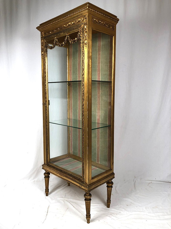 Louis XVI-style gilded stucco and wood display case, circa 1900