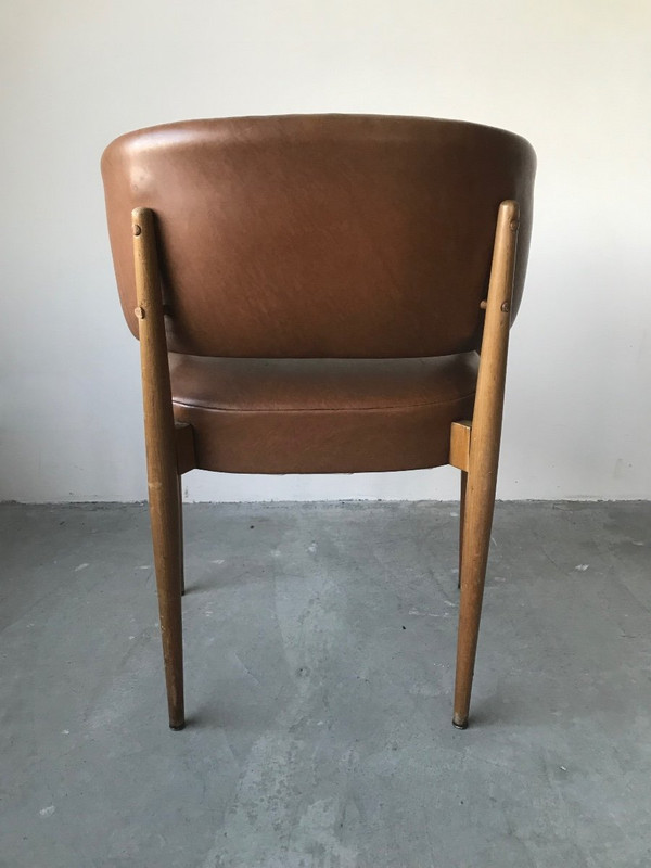 Brown leatherette armchair circa 1950.